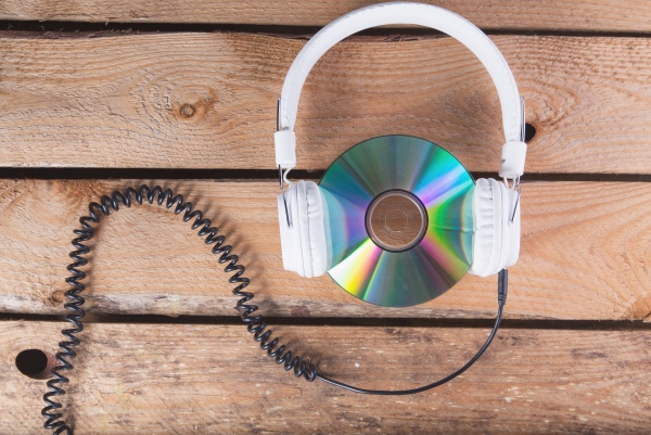 Buy CDs or fill the MP3 player with music
